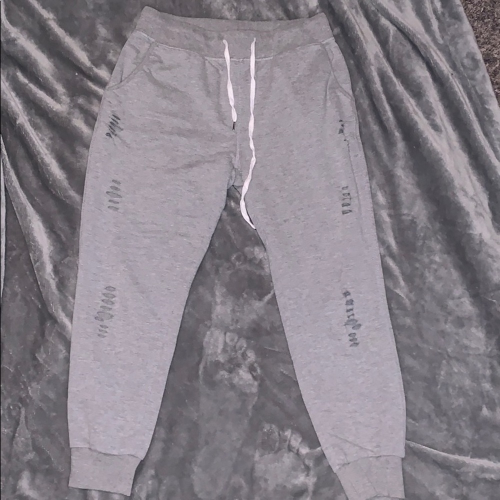 poof! ripped grey joggers